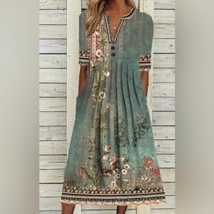 Boutique floral dress with V-neckline and pockets. New with tags. Women’s XL